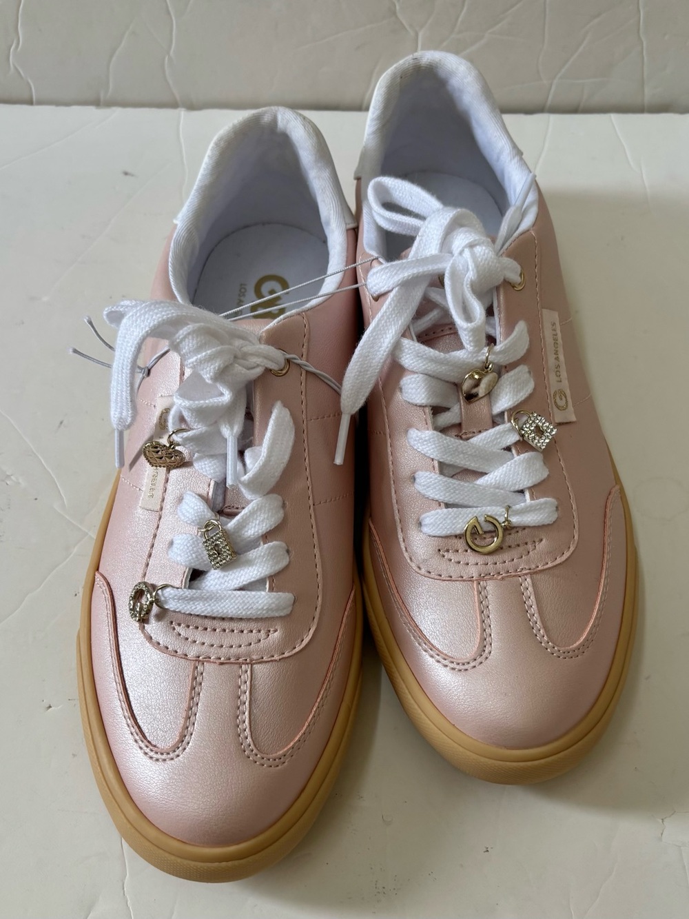 Women’s Pink Leather Lace-Up Sneakers with Gold Accents